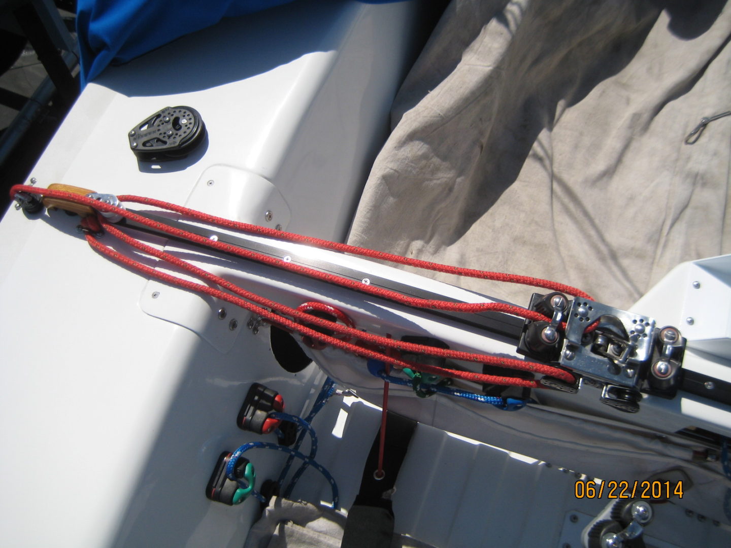 A boat with two red wires attached to it.