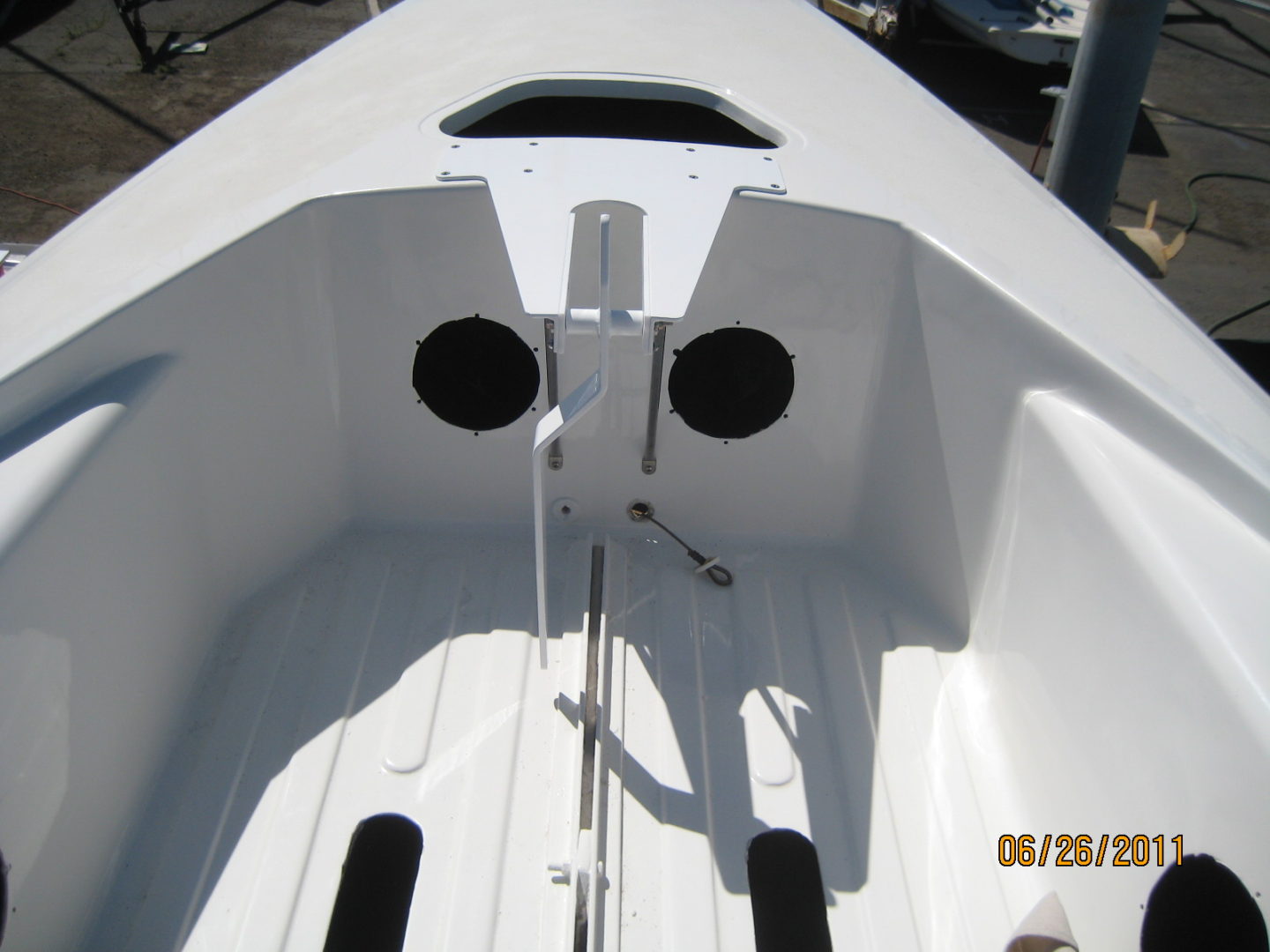 A boat with two speakers on the front of it.