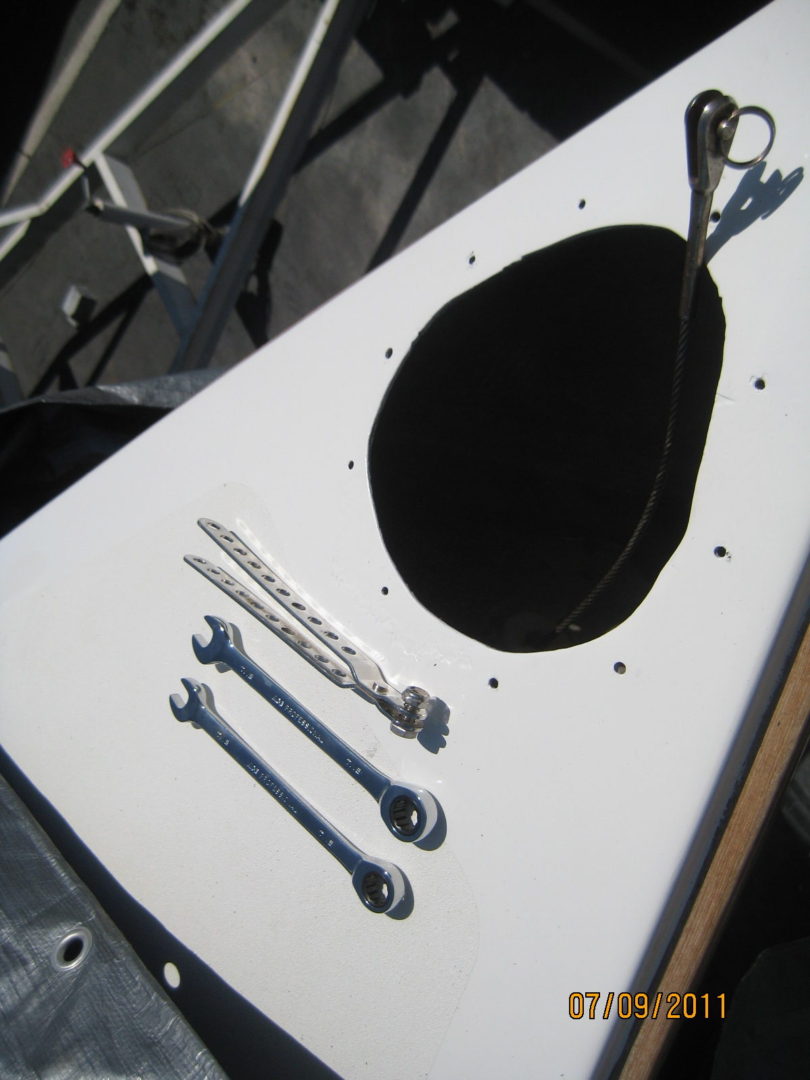 A white table with some tools on it