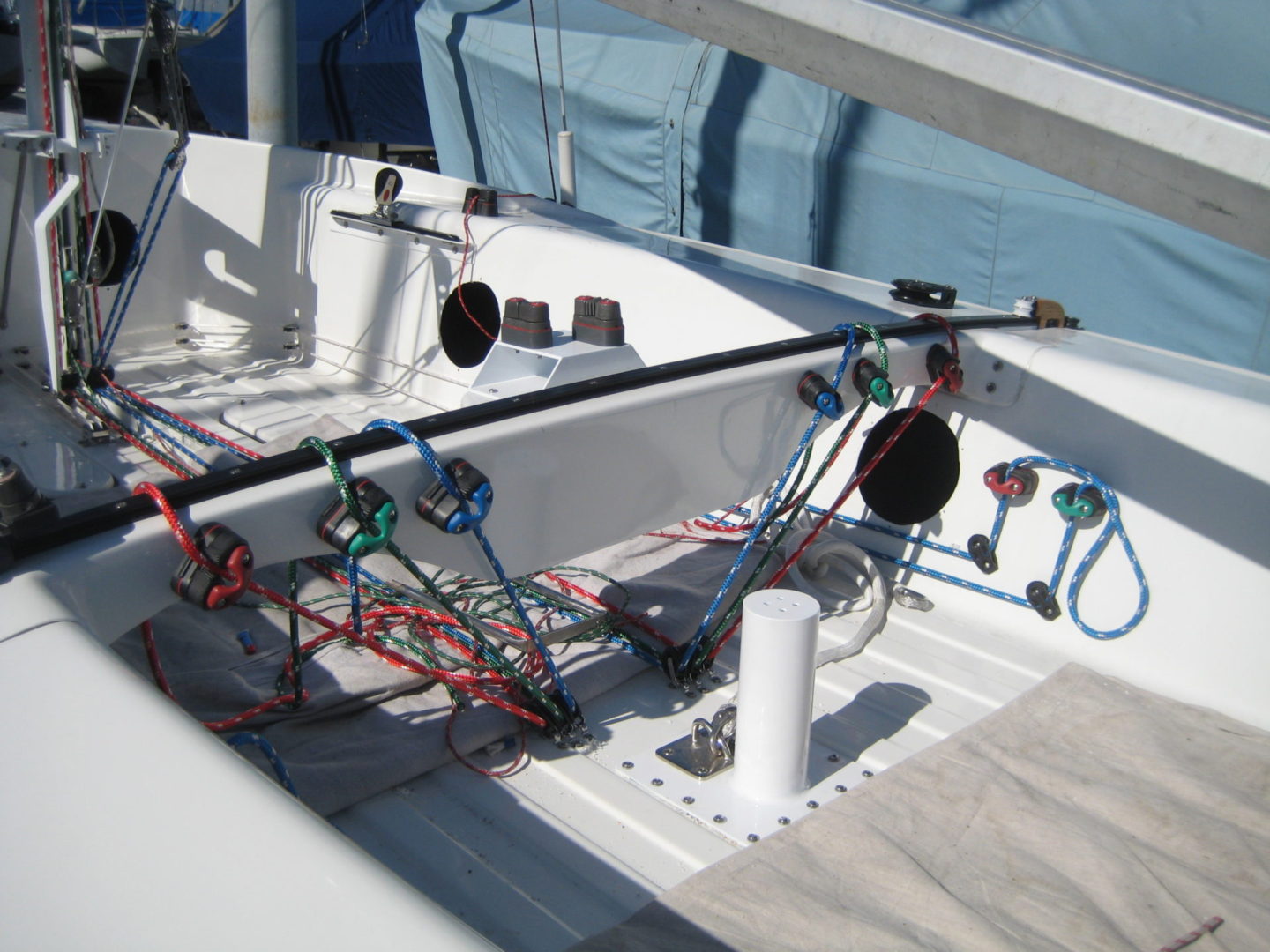 A boat with many wires attached to it.